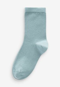 Calzino alla caviglia azzurro chiaro realizzato in materiale morbido, con un bordo a coste e una trama liscia, dotato di punta arrotondata.