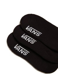 Sorte bomuldssokker med et hvidt "VANS" logo trykt på siden. Designet med lav cut og glat tekstur.