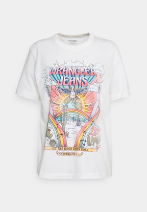 T-shirt en coton blanc avec un motif graphique coloré comprenant le texte "WRANGLER JEANS", un soleil, des cactus et des éléments musicaux.