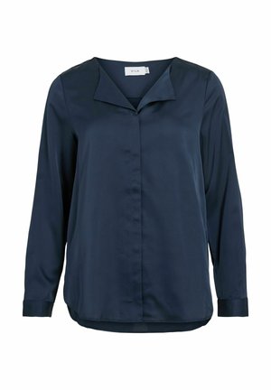 Blusa de manga larga azul marino en tejido suave, con cuello puntiagudo, cierre de botones y un dobladillo ligeramente curvado.