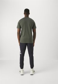 adidas Performance TR-ES FR T - T-skjorte til trening - legend ivy/black