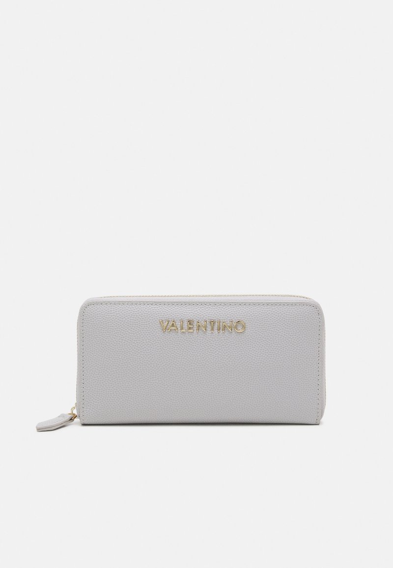 Gray leather wallet featuring a textured finish, gold logo detailing, zip closure, and a flat design. Compact and rectangular shape.