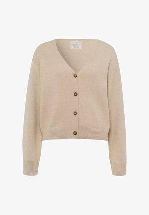 Beżowy krótki kardigan wykonany z miękkiego materiału, z dekoltem w szpic, długimi rękawami oraz pięcioma brązowymi guzikami z przodu, zakończony ściągaczami.