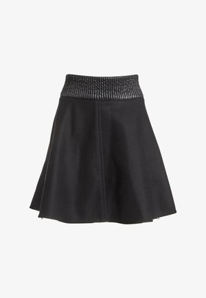 Jupe trapèze noire avec taille élastique texturée, tissu lisse et couture verticale visible au centre devant.