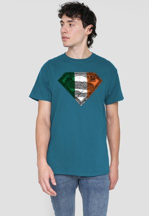 Cotton Soul, SUPERMAN/IRISH CELTIC SYMBOL - T-Shirt print - blue-grey