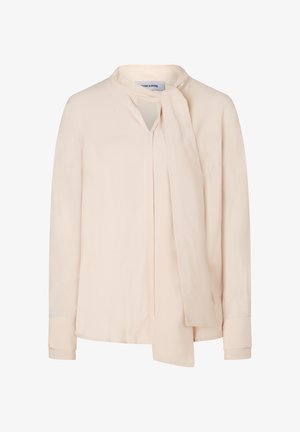 Lichtbeige blouse met lange mouwen, voorzien van een V-hals en een vastgeknoopte detail bij de kraag. Zachte stof zonder zichtbare patronen.