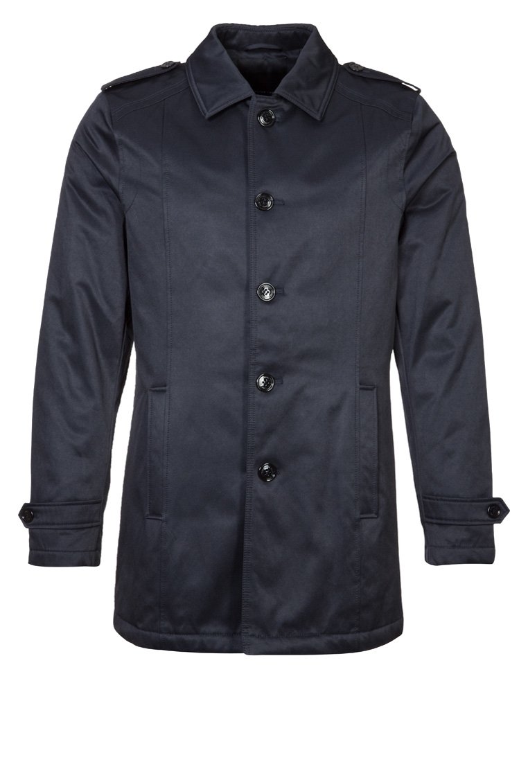 Mörkblå rock i mjukt tyg med knäppning framtill, axelklaffar och sidofickor. Rakt skuren med långa ärmar.