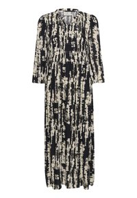 Robe maxi en noir et crème, avec un motif en coups de pinceau. Manches longues, col rond et détails froncés à la taille.