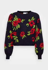 Pull court bleu marine avec motif floral rouge et vert vif, manches longues, encolure ronde, poignets et ourlet côtelés.