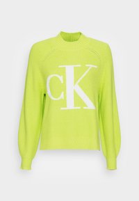 Neon-grüner, gestrickter Pullover mit Rundhalsausschnitt und langen Ballonärmeln. Mit großem weißen "CK"-Logo auf der Vorderseite. Strukturierter Stoff.