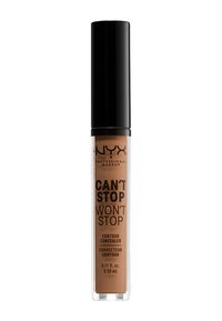 NYX Can't Stop Won't Stop Correttore Contour in un tubo trasparente, con un tappo nero, contenente liquido marrone e testo stampato sulla parte anteriore.