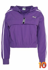Purple cropped jacket made of lightweight material, featuring a hood, white side stripes, and a front zip with a logo tag. Elastic cuffs and hem.