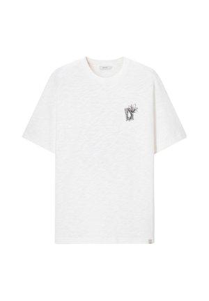 White short-sleeve t-shirt with small black line drawing of a framed plant and flower on the left chest.