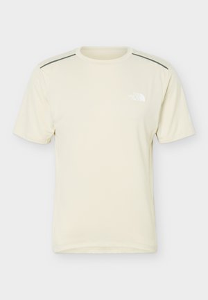 T-shirt beige clair à manches courtes et col rond avec des bandes grises réfléchissantes sur les épaules et un petit logo blanc "The North Face" sur la poitrine.