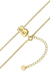 Zelta ķēdes kaklarota ar noapaļotas burta "B" piekariņu ar divām izdurtām caurumiem. Ietver regulējamu ķēdi ar apaļu sprādzi.