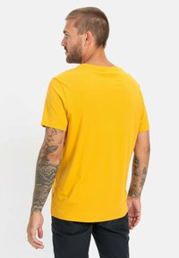 camel active KURZARM - T-shirt basic - cumin yellow
