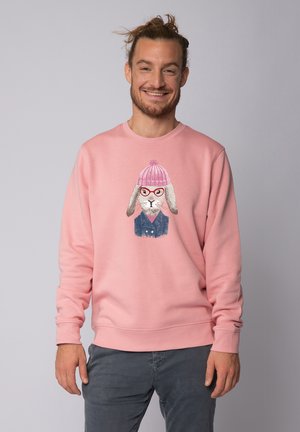 Roze sweatshirt van katoen met een ronde hals en lange mouwen, met een konijnenafbeelding die een bril en een muts draagt.