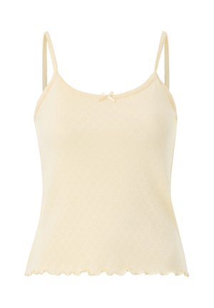 Camisola para mujer color crema con tirantes finos, pequeño lazo en el escote, patrón de corazones texturizados y borde ondulado.