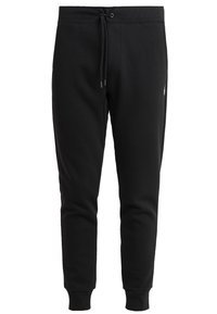 Svarta bomulls-joggingbyxor med justerbart dragsko i midjan, avsmalnande ben, ribbade muddar och en liten logotypdetalj på sidan.