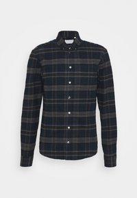 Camicia flanella da uomo a quadri navy e grigi, con maniche lunghe, chiusura a bottoni e design del collo classico. Texture morbida, senza motivi.