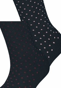 Baumwollcrew-Socken in dunkelblau mit kleinen rosa und roten Punkten, geripptem Muster, verstärkten Fersen und glatten Zehennähten.