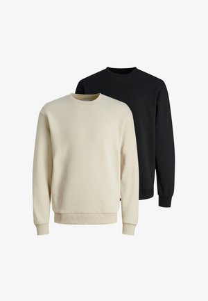 Deux sweatshirts à col rond, l'un crème et l'autre noir. Les deux ont une coupe décontractée, des poignets et une ourlet côtelés, avec un tissu doux et texturé.