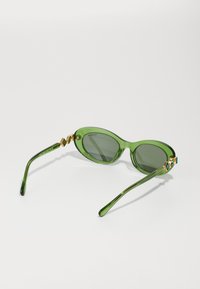 Swarovski Päikeseprillid - transparent green