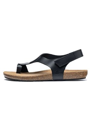 Sandales en cuir noir avec semelle en liège, design en T, bride arrière réglable, semelle plate, dessus texturé et détails de logo sur le côté.