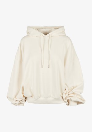 Helle, cremefarbene Oversize-Hoodie mit einer Kapuze zum Schnüren, weicher Textur, geripptem Saum und lockerer Passform. Keine sichtbaren Muster oder Akzente.