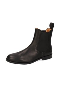 Bota Chelsea de cuero negro con panel elástico en el costado y tira en el talón, acabado liso, tacón bajo y puntera redondeada.