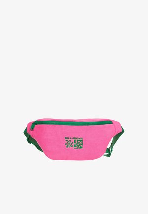 Sac banane Billabong rose vif avec fermeture éclair verte, logo et sangle ajustable sur fond blanc.