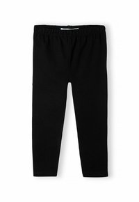 Leggings noirs en tissu extensible, avec une taille élastique et une texture lisse. Design simple, sans motifs ni accents.