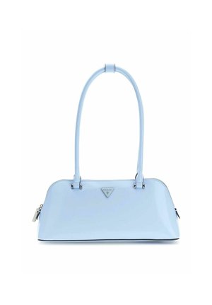 Light blue glossy handbag with long double handles and triangular metal Guess logo on front, zippered closure visible on sides.