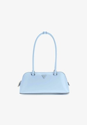Light blue glossy handbag with long double handles and triangular metal Guess logo on front, zippered closure visible on sides.