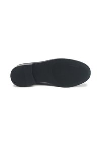 Suola in gomma nera con superficie texture e tacco arrotondato. Design piatto senza marchi visibili o dettagli aggiuntivi.