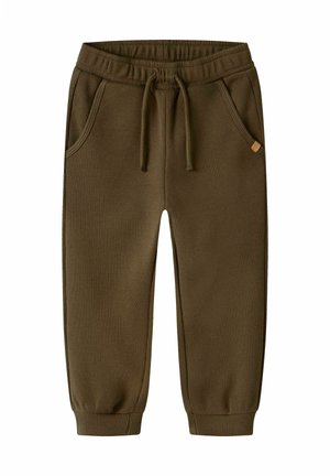 Brune vaffelstrikkede børnebukser med elastisk linning, snor, sidelommer og ribkant ved anklerne.