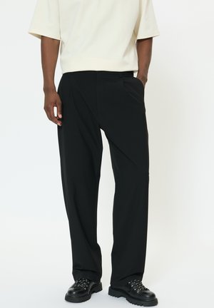 PLEAT - Stoffhose - black