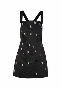 Robe mini noire sans manches avec larges bretelles, taille cintrée et petites décorations dispersées en pierres précieuses transparentes rectangulaires.