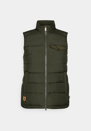 Green puffer vest features a high collar, front zipper, chest pocket with a button, and a textured surface. Logo patch on the lower side.