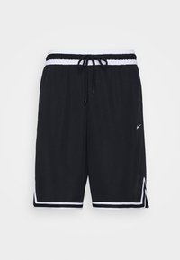 Shorts de sport noirs avec une taille élastique blanche et des bandes blanches à l'ourlet, un cordon de serrage et un petit logo Nike blanc sur la jambe droite.