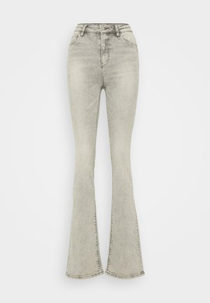 Ανοιχτό γκρι τζιν με φαρδιά κοπή και ψηλή μέση, κατασκευασμένα από τζιν, με φερμουάρ και διακριτές ραφές κατά μήκος των ραφών.