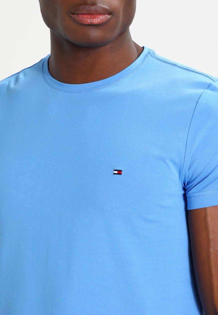 Tommy Hilfiger STRETCH SLIM FIT TEE - T-shirt print - blue/Lichtblauw -  Zalando.nl