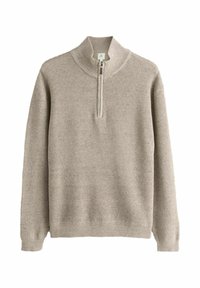 Beige gebreide trui met een halve ritssluiting, geribde boorden en zoom, met een gestructureerd steekpatroon.