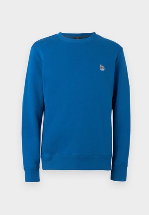 Blaues Sweatshirt mit Rundhalsausschnitt, langen Ärmeln und kleinem mehrfarbigem Zebra-Logo auf der linken Brust vor weißem Hintergrund.