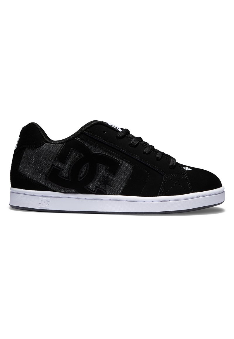 Black sneakers with a suede and canvas combination. Features a large black DC logo, a white sole, and black laces.