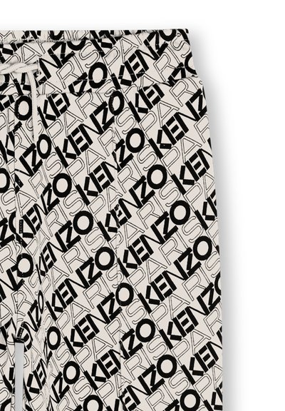 Kenzo broek met een geometrisch patroon van zwarte tekst op een beige achtergrond. Elastische tailleband met trekkoord voor een verstelbare pasvorm.