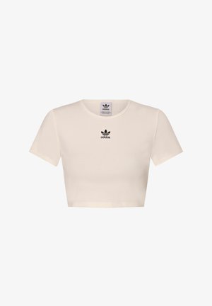 Saīsināta balta ribota T-kreklu, izgatavots no auduma ar īsām piedurknēm, ar melnu Adidas logotipu centrā virs apkakles.