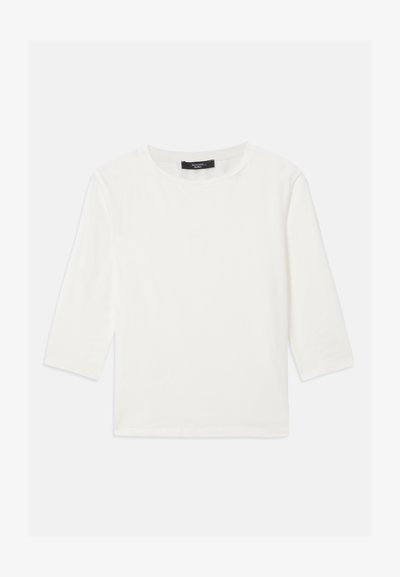 T-shirt blanc à manches longues et col rond avec un ourlet droit, présenté à plat sur un fond blanc.