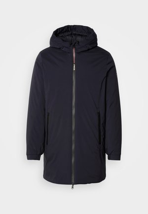 Navy waterproof parka jacket featuring a hood, front zipper, and two side pockets with black detailing and elasticized cuffs.