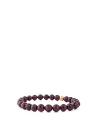 Purple bead bracelet made of polished stone with a gold decorative accent. Beads are evenly sized and round, creating a uniform design.